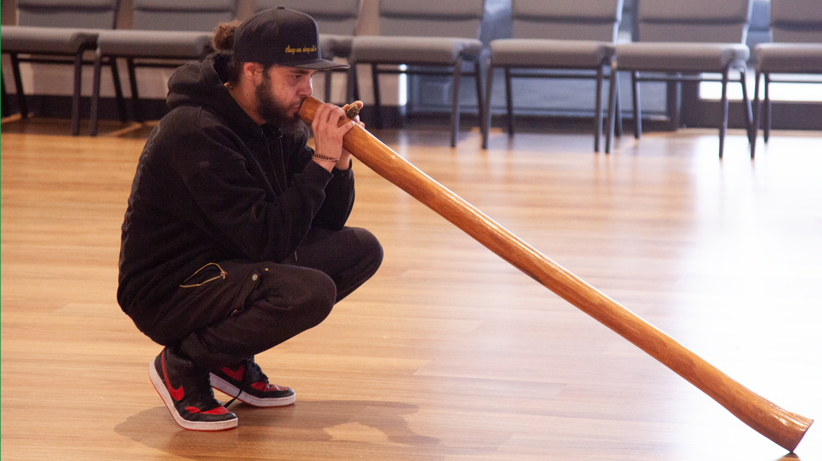 Presenter Playing the Didgeridoo, Aboriginal Infusion program