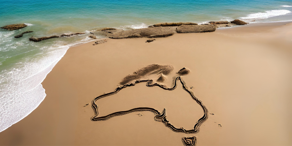 Shape of Australia, drawn in the sand on a beach