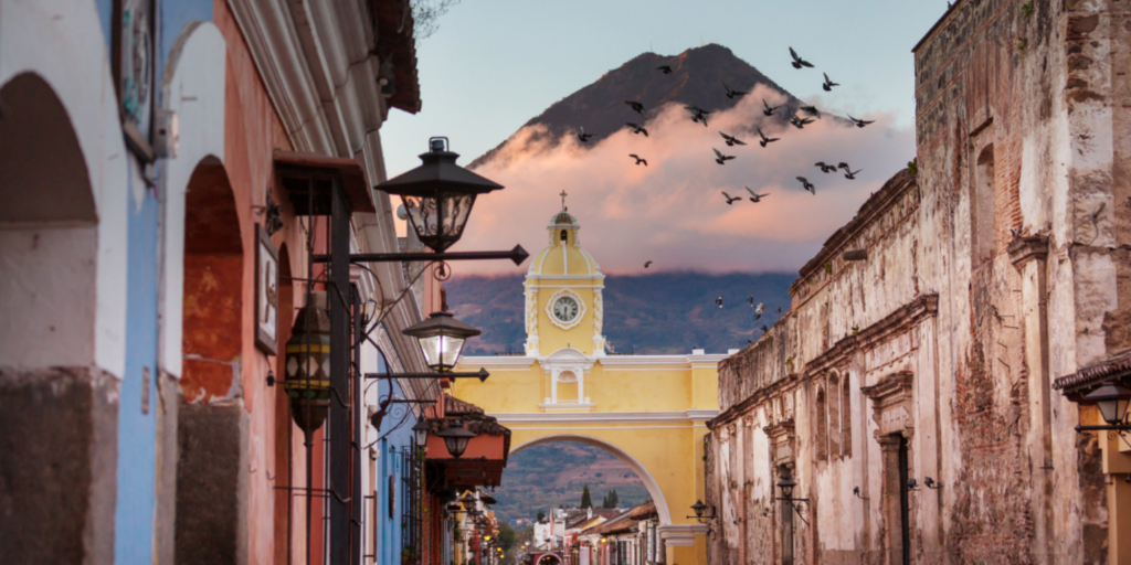 5 Easter Celebrations Around the Globe: Embracing Diversity and Tradition: this is an image on Antigua. It features a mountain in the background.
