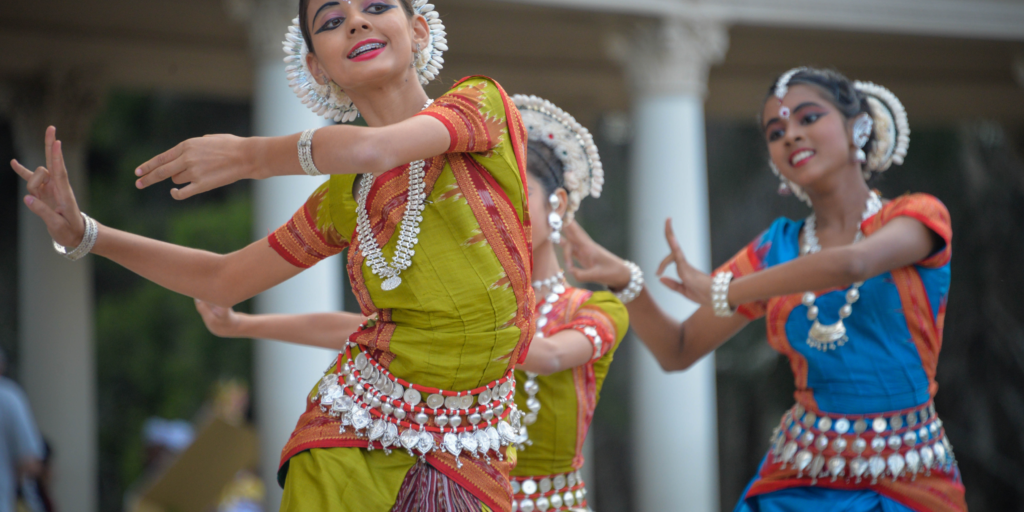 14 April Dates to Celebrate - This is a photo of 3 women Bollywood Dancing.
