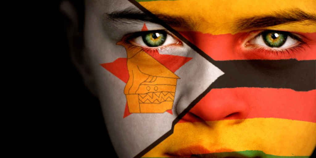 14 April Dates to Celebrate - This is a photo of a child's face painted with the Zimbabwean flag.